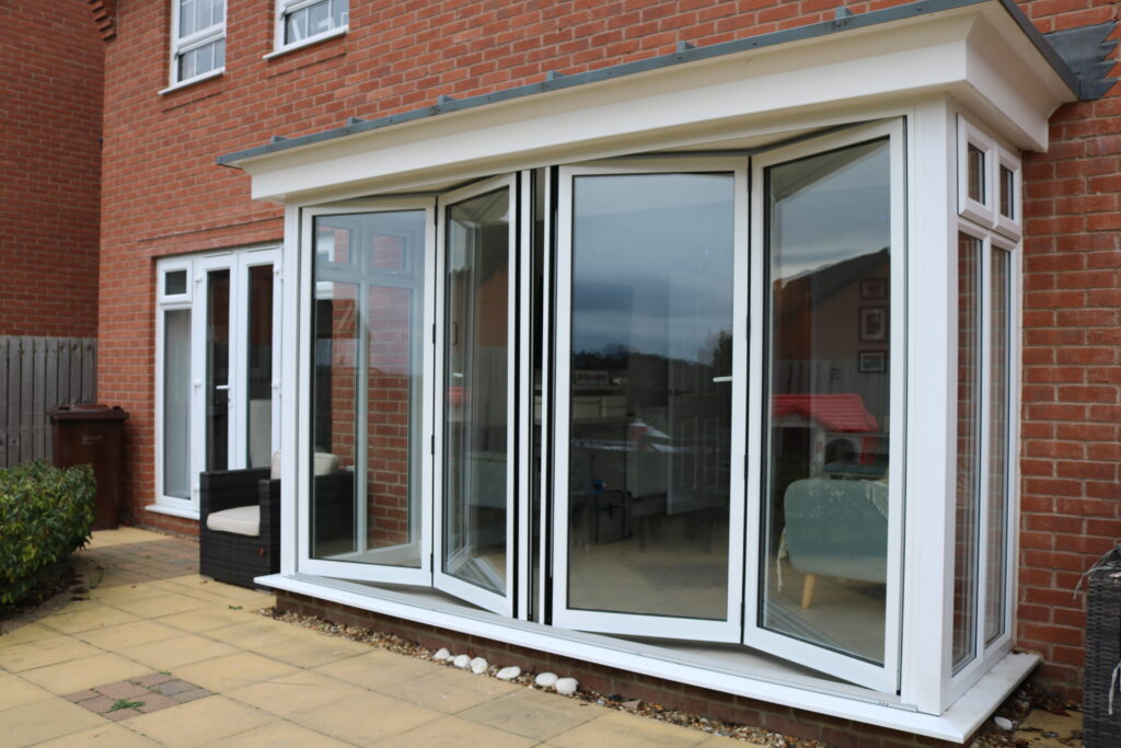 This is a photo of Aluminium Bi-folding doors installed in Croydon. The work was carried out by Bi-folding Doors Croydon